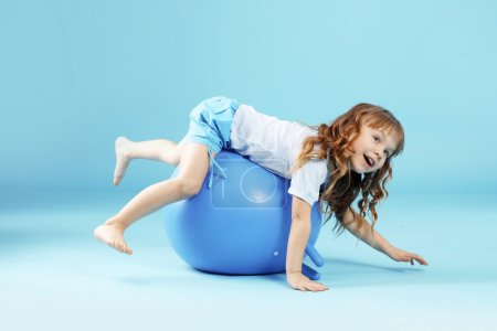 Child with gymnastic ball