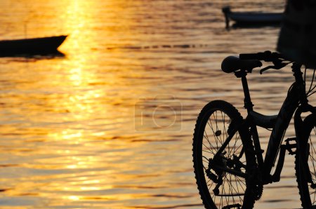 Bike on sunset beach