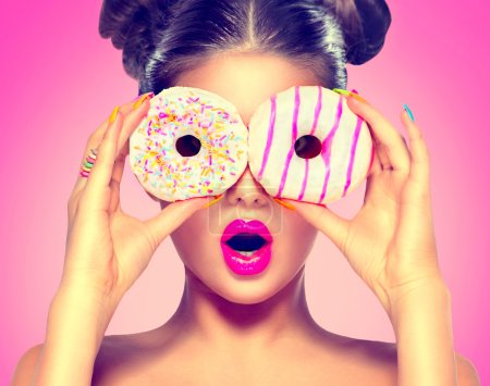 model girl taking colorful donuts.
