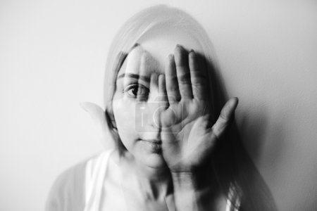double exposure of young female and hands
