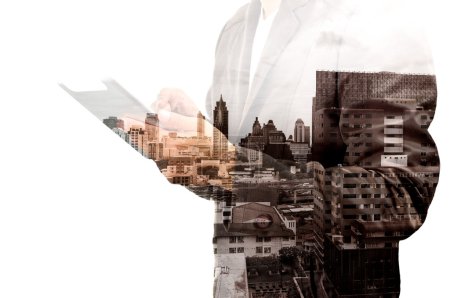 Double Exposure Hand of Businessman and City Building 
