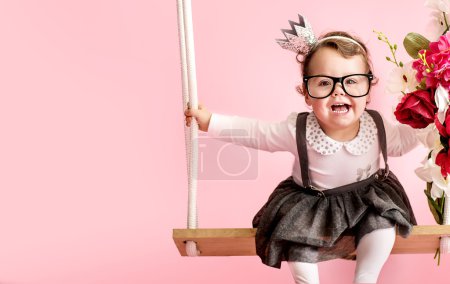 Portrait of a cute toddler wearing glasses