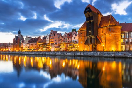 Old town of Gdansk with ancient crane at dusk