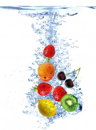 Fruit splashing into the water