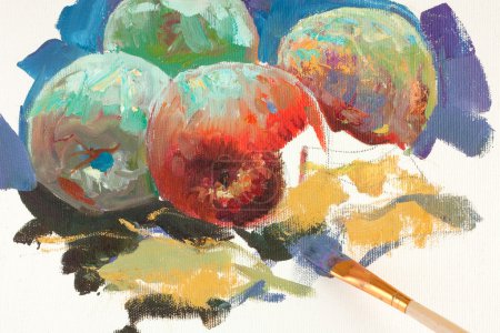 Unfinished drawing of apples and paintbr