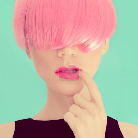 Fashion girl with pink hair.