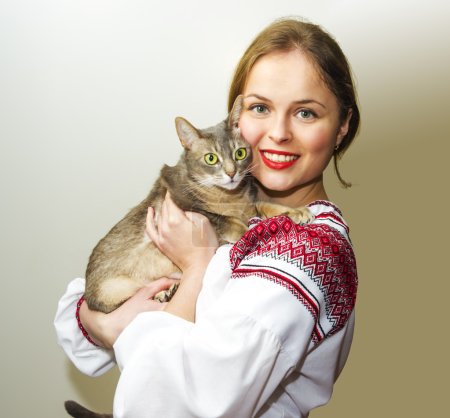 Portrait of beautiful young woman in the Ukrainian national clot