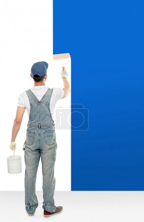 painter painting some walls with blue paint