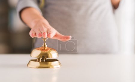 Woman Ringing Service Bell
