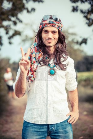 Hippie Portrait showing Peace Sign
