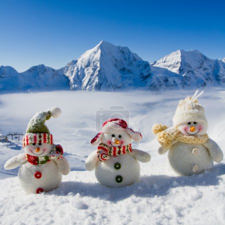 Winter, snow, sun and fun - happy snowman friends