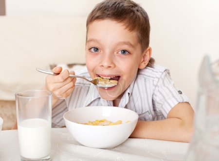 Child eat breakfast