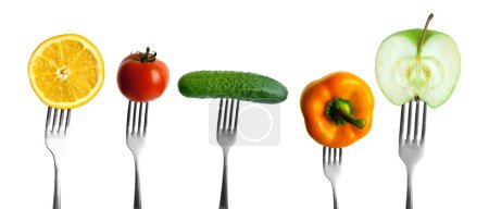 vegetables and fruits on forks