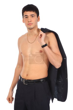 Young topless asian man with coat on shoulder