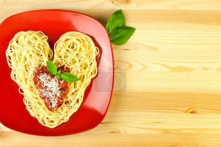 I love Pasta / Spaghetti on a plate and wooden table / Heart Sh