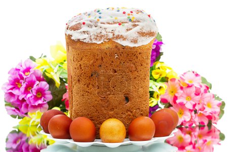 Easter cake and eggs on white