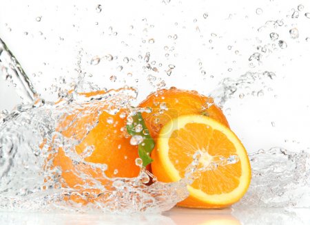 Orange fruits and Splashing water