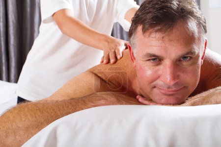 Mature man having massage