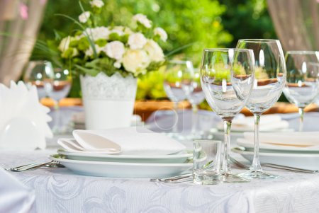 Beautifully served table in a summer pavilion