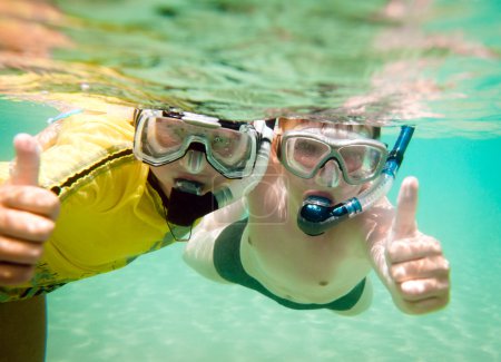 Two boys underwater