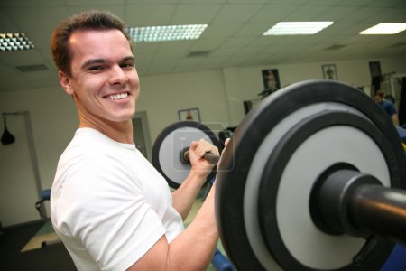 Gym man with barbell 2