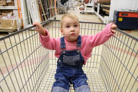 Baby in shop carriage