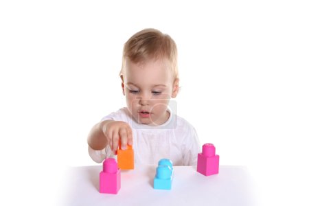 Baby with toy blocks