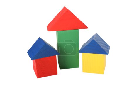 Three wood toy houses