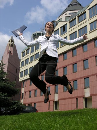 Jump happy businesswoman