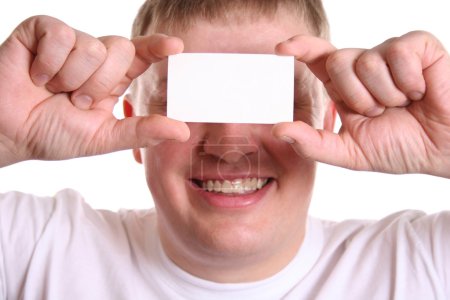 Man with card for text on eyes