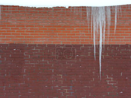 Icicle. brick wall