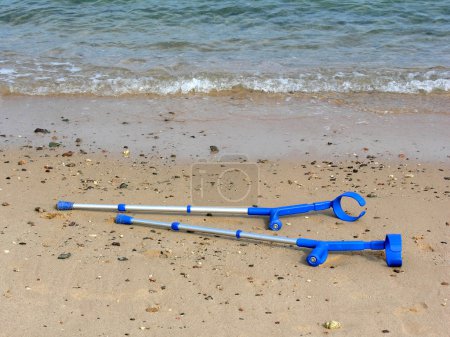 Crutches on beach