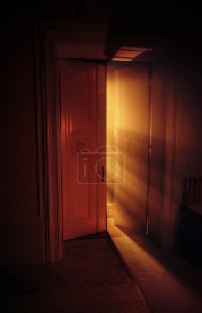 Heavenly rays of light behind the door