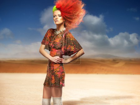Fashionable woman in the desert