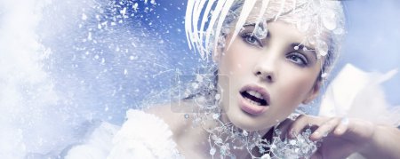 Beauty woman over winter background