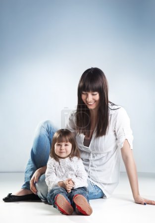 Smiling woman and her daughter