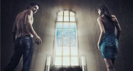 Conceptual image of a young couple stepping into the window light