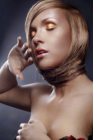 Portrait of beautiful blond woman with stylish make-up