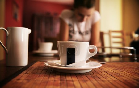 Cute brunette on a coffee-break