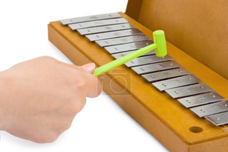 Hand and xylophone