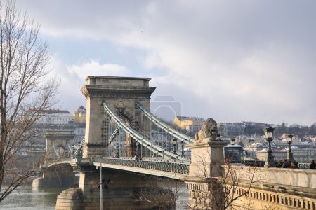 Old budapest chain bridge at day on danube river