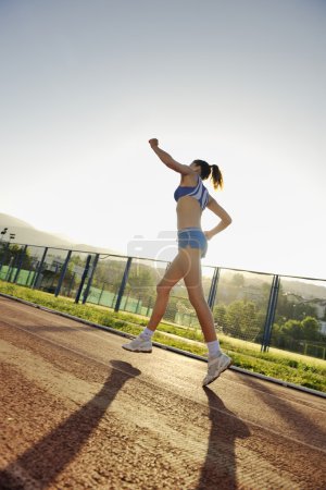Woman jogging at early morning
