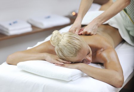 Woman back massage treatment