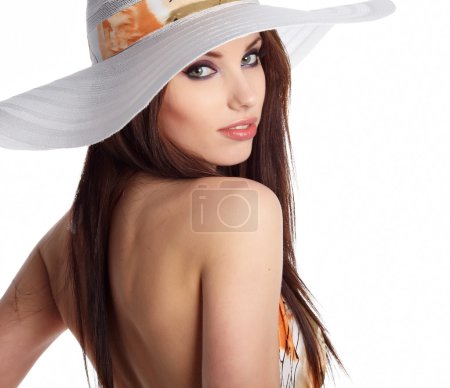 Beautiful woman in white straw summer hat