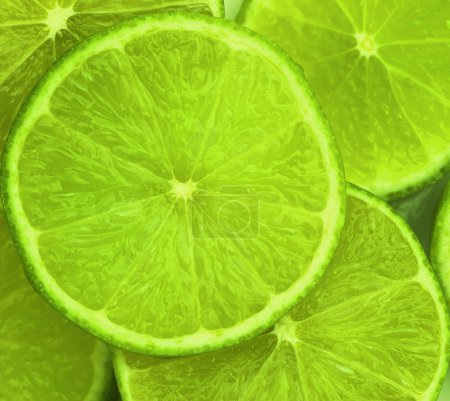 Lime slices abstract food background