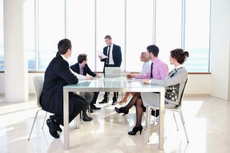 Group of business at meeting