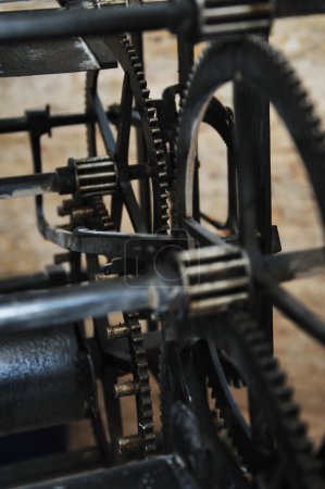 Old big clock mechanism machine engine
