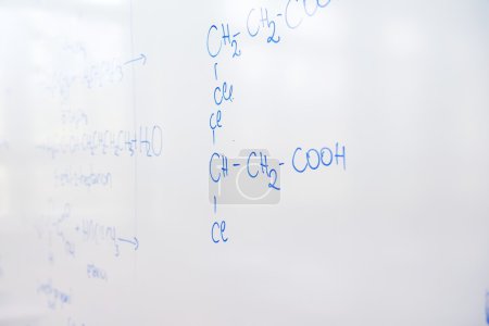 Chemical molecule structure on white board