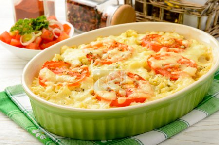 Casserole with minced meat, vegetables and cheese.