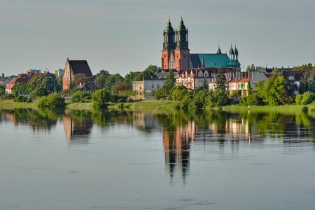 Urban landscape of the Warta River and a cathedral